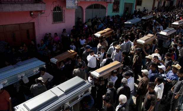 Photo 14of 19 |  |  | People carry the coffins
